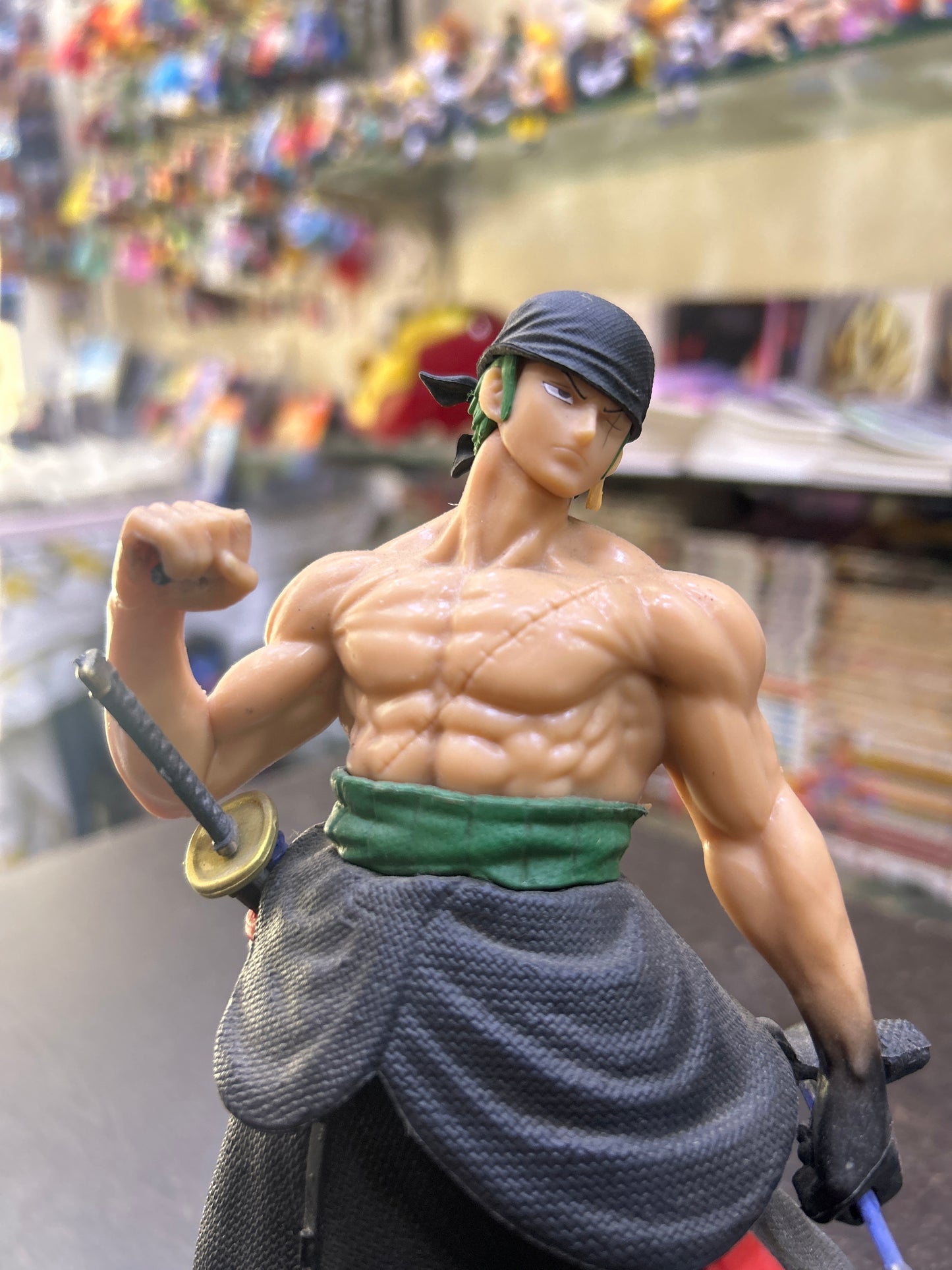 (Defective Piece)Killer Zoro Action Figure (the sword in hand is broken the images are given)will come with an extra spare sword which can be fixed with glue!