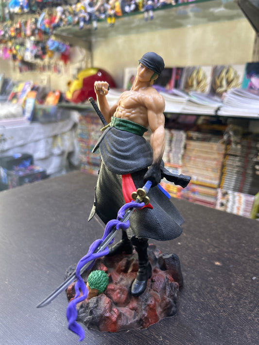 (Defective Piece)Killer Zoro Action Figure (the sword in hand is broken the images are given)will come with an extra spare sword which can be fixed with glue!