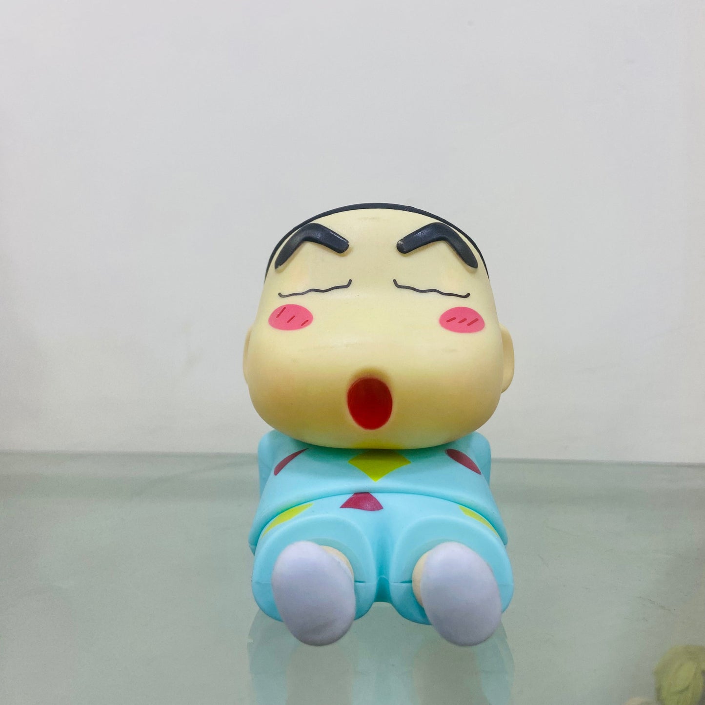 Sleeping Shinchan phone stand Action Figure